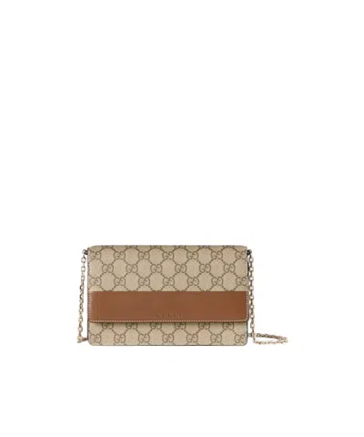 Gucci Gg Emblem Chained Wallet In Brown