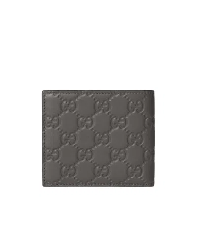 Gucci Gg Emblem Embossed Wallet In Pattern