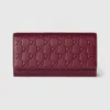 Gucci Gg Emblem Continental Wallet In Burgundy