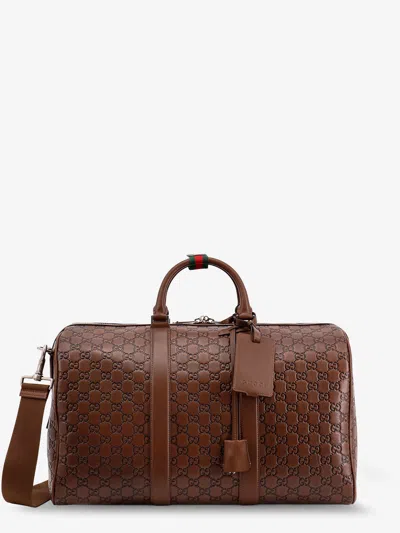 Gucci Gg Emblem Duffle Bag In Brown