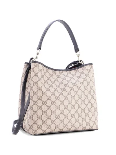 Pre-owned Gucci Gg Emblem Gg Coated Canvas Medium Bucket Bag In Brown