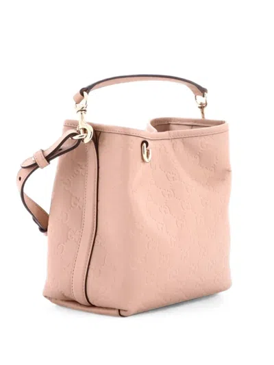 Pre-owned Gucci Gg Emblem Gg Embossed Leather Small Bucket Bag In Neutrals