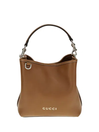 Gucci Gg Emblem Leather Bucket Bag In Brown