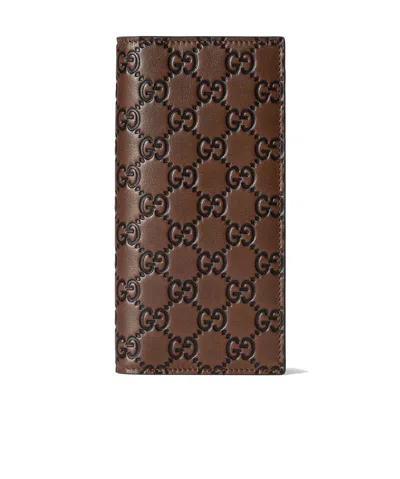 Gucci Gg Emblem Long Wallet In Brown