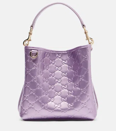 Gucci Gg Emblem Medium Metallic Leather Bucket Bag In Purple