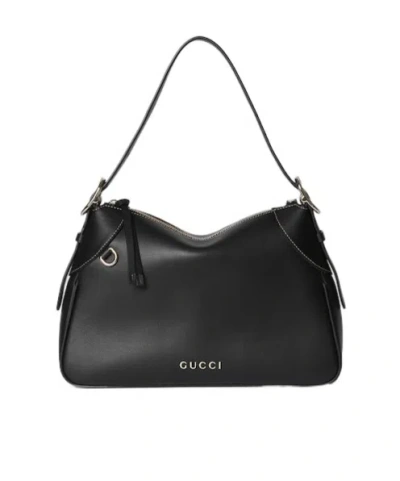 Gucci Gg Emblem Medium Shoulder Backpack In Black