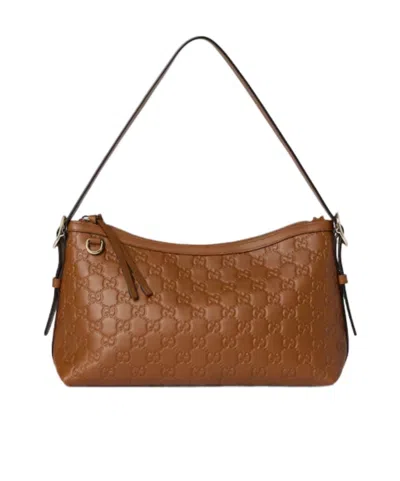 Gucci Gg Emblem Medium Shoulder Bag In Brown