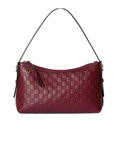 Gucci Gg Emblem Medium Shoulder Bag In Red