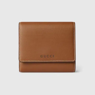 Gucci Gg Emblem Medium Wallet In Brown