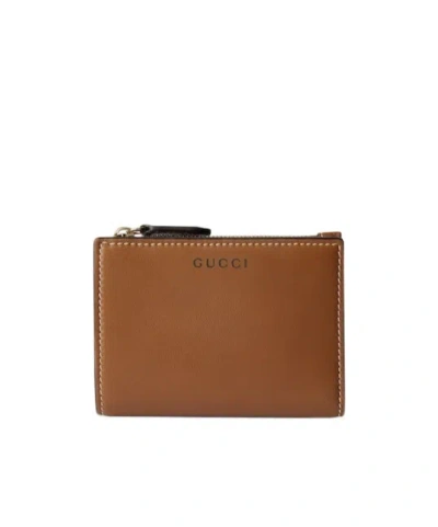 Gucci Gg Emblem Medium Wallet In Brown
