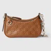 Gucci Gg Emblem Mini Shoulder Bag In Brown