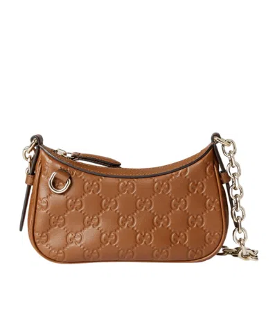 Gucci Gg Emblem Mini Shoulder Bag In Brown