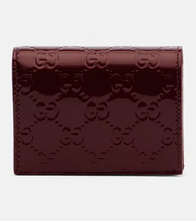 Gucci Gg Emblem Patent Leather Wallet In Burgundy