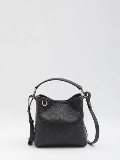 GUCCI GUCCI  GG EMBLEM SMALL BLACK BUCKET BAG