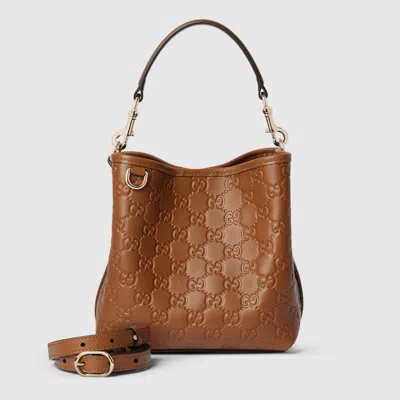 Gucci Gg Emblem Small Bucket Bag In Brown