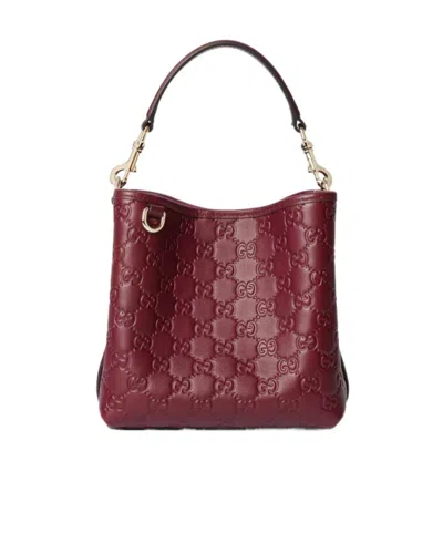 Gucci Gg Emblem Small Bucket Bag In Red