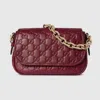 Gucci Gg Emblem Small Shoulder Bag In Burgundy
