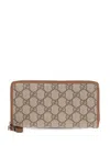 Gucci Women Gg Emblem Zipped Wallet In Brown
