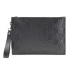 GUCCI GUCCI GG EMBOSSÉ BLACK LEATHER CLUTCH BAG (PRE-OWNED)