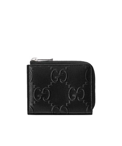 Gucci Gg Embossed Compact Wallet In Black