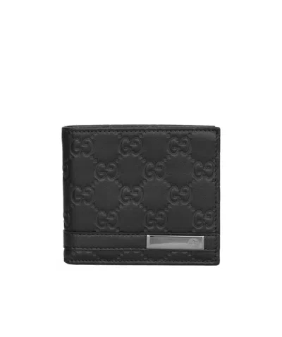 Gucci Gg Embossed Double Fold Wallet In Black