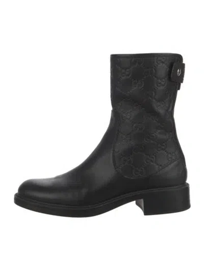 Pre-owned Gucci Gg Embossed Leather Boots In Black