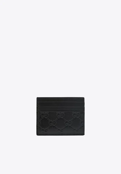 Gucci Gg Embossed Leather Cardholder In Black