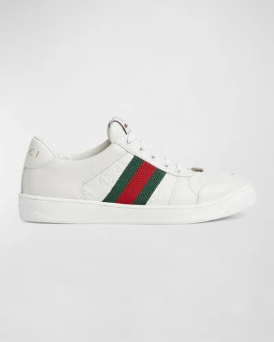 Gucci Gg Embossed Leather Low-top Sneakers In Great White