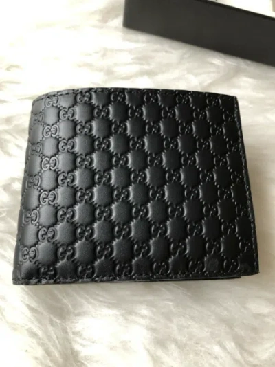 Pre-owned Gucci Gg Embossed Leather Men's Wallet ( ) In Black