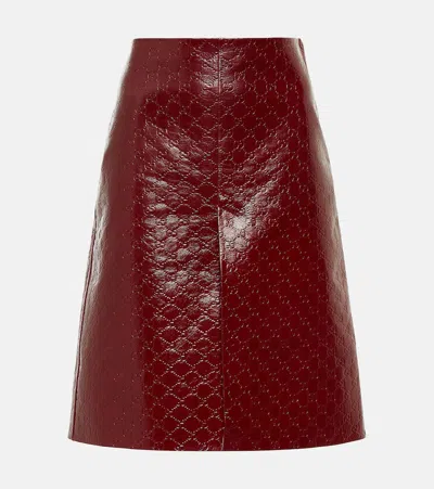 Gucci Gg Embossed Leather Midi Skirt In Red