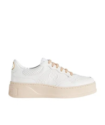 Gucci Gg Embossed Low-top Sneakers In White