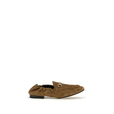 Gucci Gg Embossed Suede Loafer In Brown