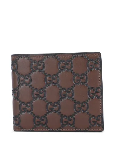 Gucci Gg-embossed Wallet In Pink