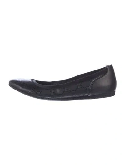 Pre-owned Gucci Gg Imprimé Leather Slides In Black