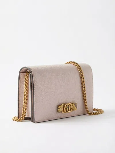 Gucci Gg Incrocio Leather Clutch In Pink