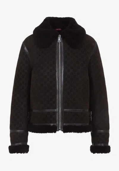 GUCCI GG LEATHER AND SHEARLING JACKET