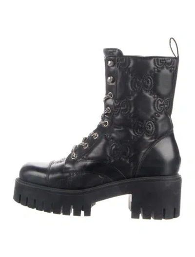Pre-owned Gucci Gg Logo Embossed Leather Combat Boots In Black