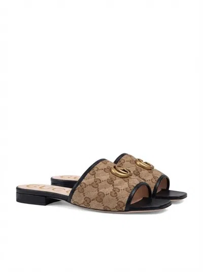 Gucci Gg Matelassé Mules In Brown