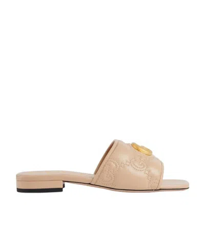 Gucci Gg Matelassé Slide Sandals In Brown