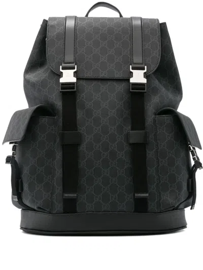 Gucci Gg Monogram Buckled Backpack In Black