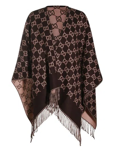 Gucci Gg-patterned Fringed Poncho In Brown