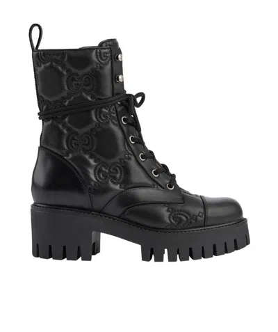 Gucci Quilted-logo Leather Combat Boots In Nero