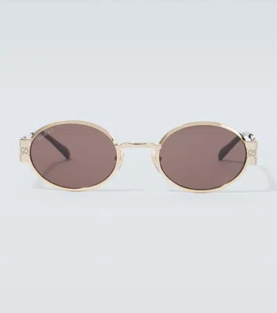 Gucci Gg Round Sunglasses In Gold
