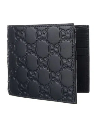 Pre-owned Gucci Gg Signature Leather Bifold Wallet In Black