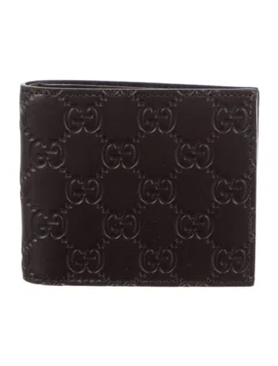 Pre-owned Gucci Gg Signature Leather Bifold Wallet In Brown