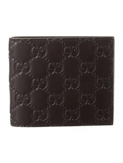 Pre-owned Gucci Gg Signature Leather Bifold Wallet In Brown