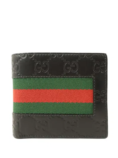 Pre-owned Gucci Gg Signature Web-stripe Bifold Wallet In Black