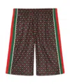 Gucci Gg Star Printed Stretch Shorts In Black