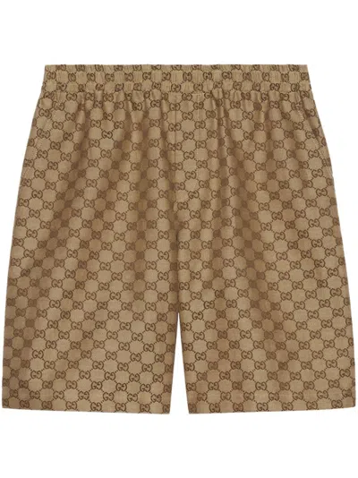 Gucci Shorts Aus Gg Supreme-leinen In Brown