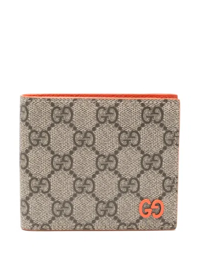 Gucci Gg Supreme Bi-fold Wallet In Neutral